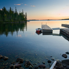 A small boat docked on Isle Royal National Park in Michigan