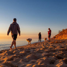 Visitors enjoying the sunset on Lake Michigan near Holland, Michigan